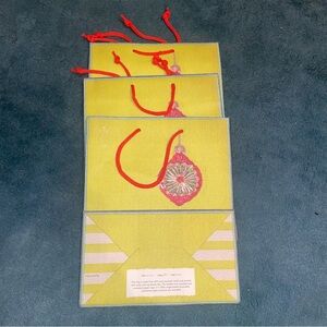 ONE ☝️ Anthropologie Vibrant Yellow and Red Gift Bag
